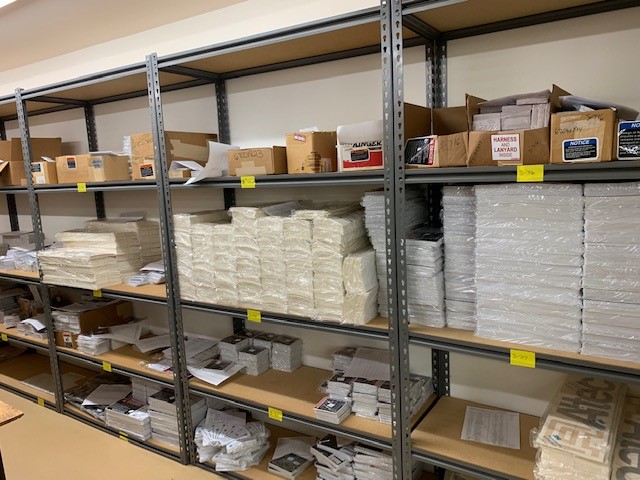 Organized inventory shelves in the VGS warehouse